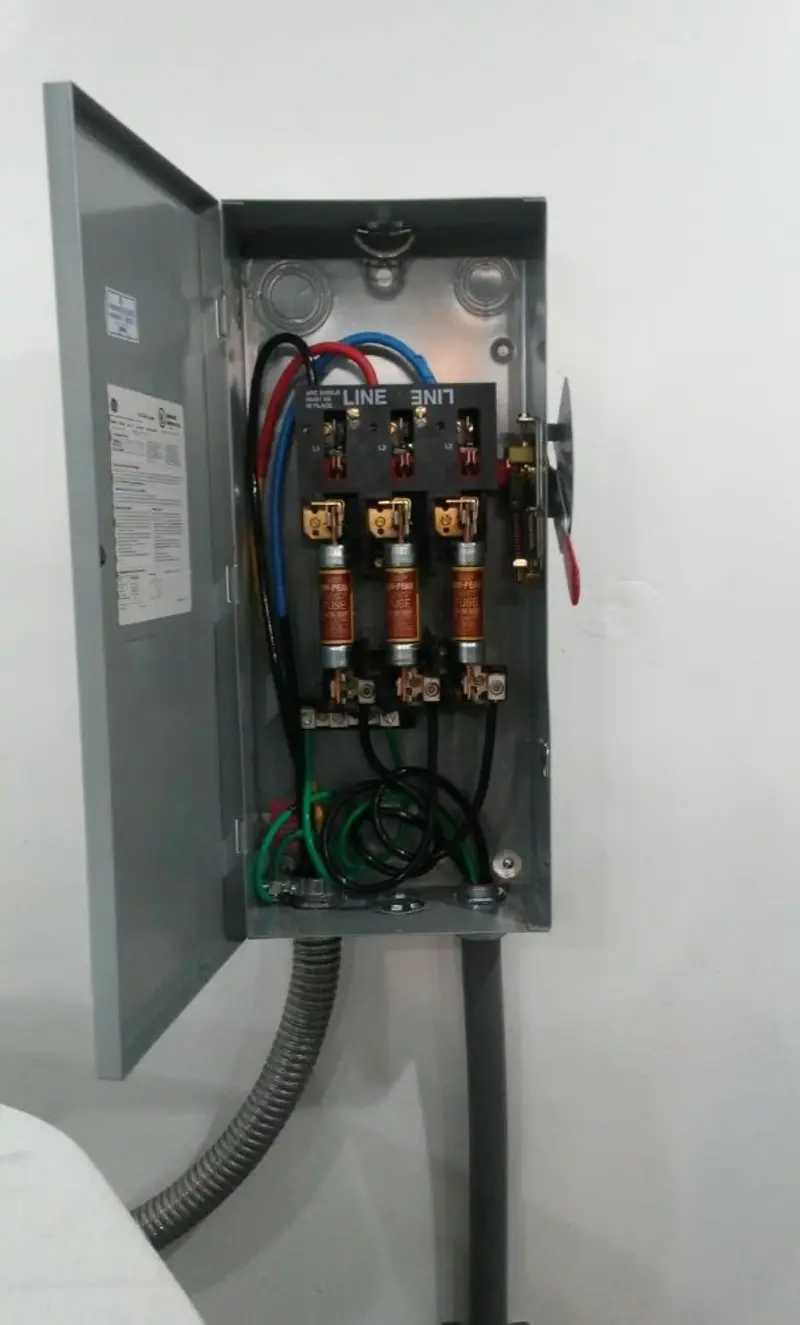 Three-phase disconnect switch installed for Smoke Detector Installation in Olive